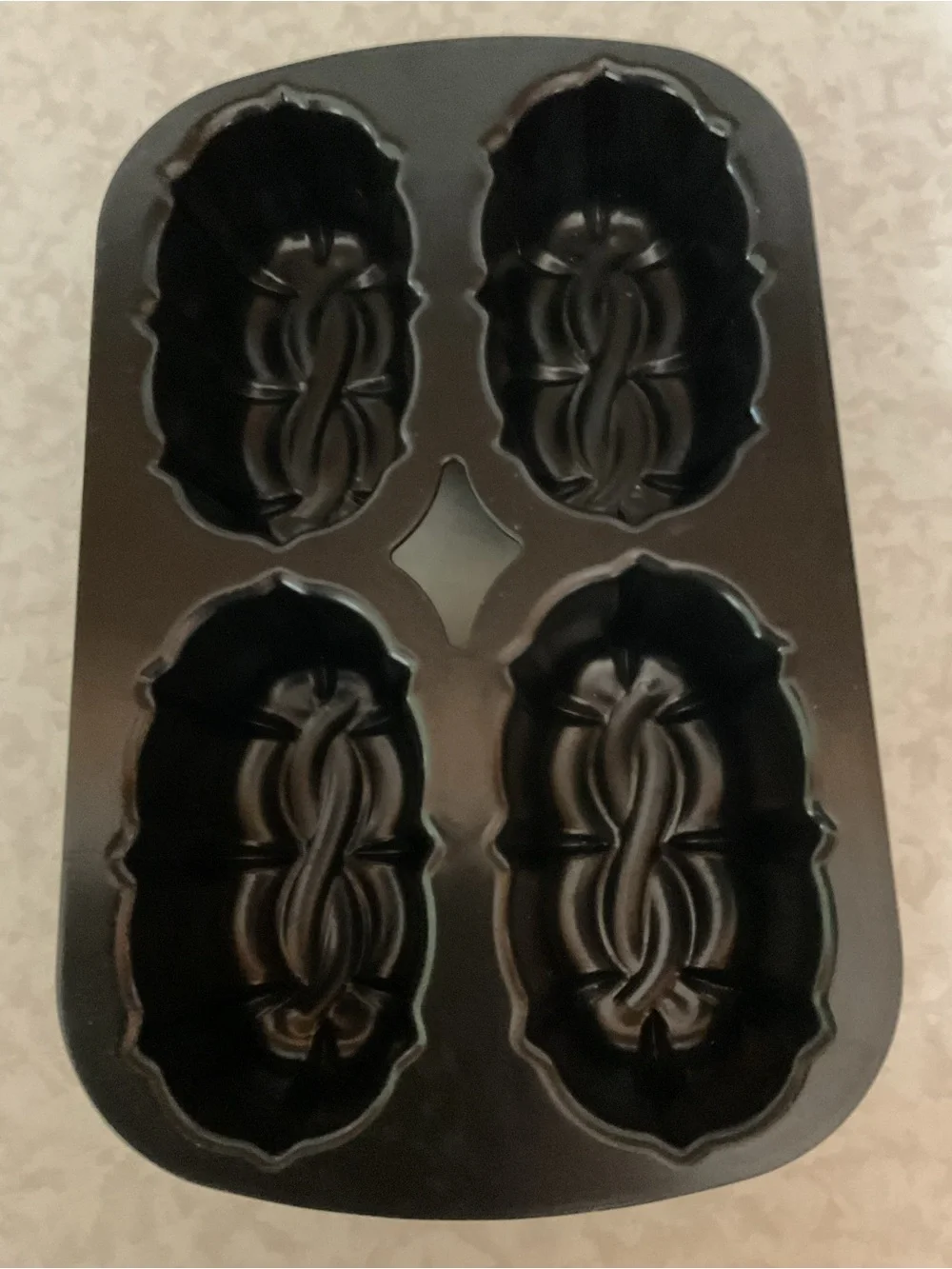 Nordic Ware Black Cast Aluminum 4-Cavity Loaf Pan Celtic knot design